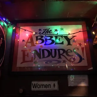 a sign for women&apos;s restroom