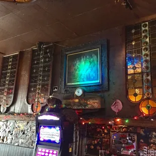 a bar with a lot of different items on the wall