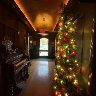 a christmas tree and piano