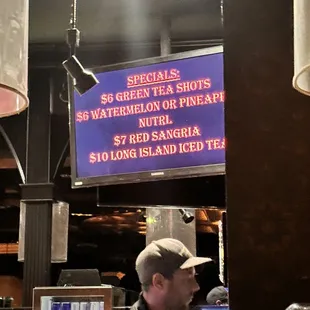 a man sitting at a bar