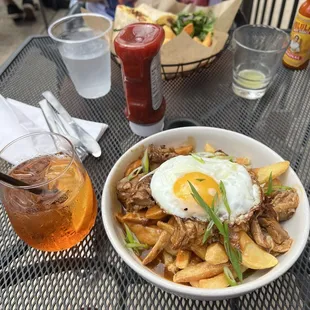 Poutine and aperol spritz