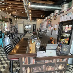 The long extended bar for many beer tasters ready for a unique FLIGHT sampling of your choice!