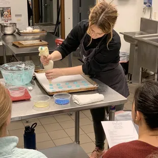 Becki's macaron demo before trying it out ourselves!