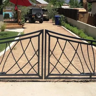 Automatic double swing gates