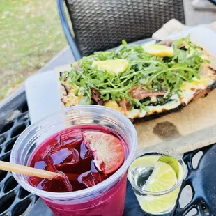 White pizza and hibiscus ranch water and a shot of mezcal