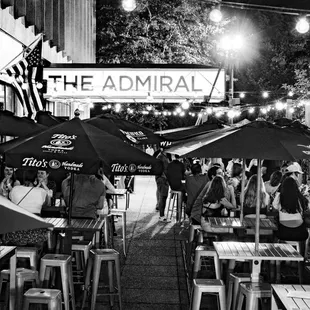 a black and white photo of a restaurant