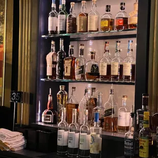 a bar filled with liquor bottles