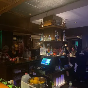 people sitting at the bar