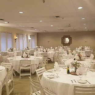 Banquet/formal private dining room set up for a wedding reception dinner