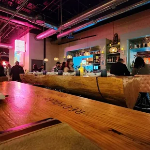 people sitting at the bar