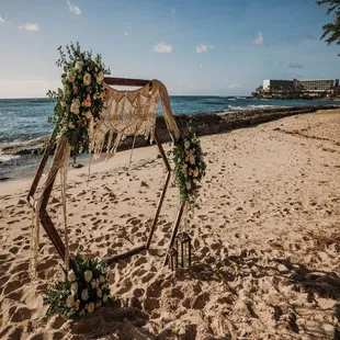 a picturesque backdrop filled with boho beauty, delicate flowers, and breathtaking coastal charm.