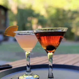 two cocktails on a tray