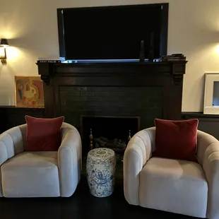Room 1 B fire place and seating area.