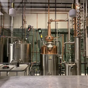 Sit at our food counter and watch the distillers make the magic happen