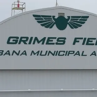 the sign for grims field urban municipal airport