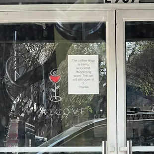 a sign in the window of a restaurant