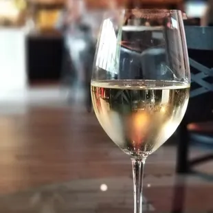A glass of Pinot Grigio.