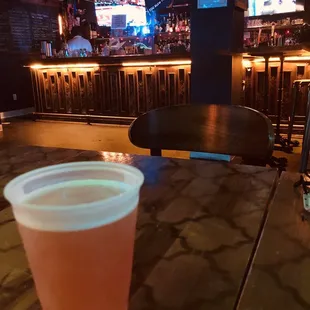 a drink in a plastic cup