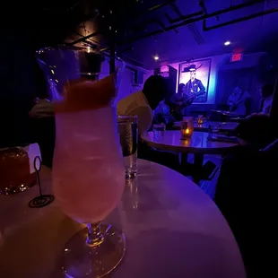 a cocktail in a glass on a table