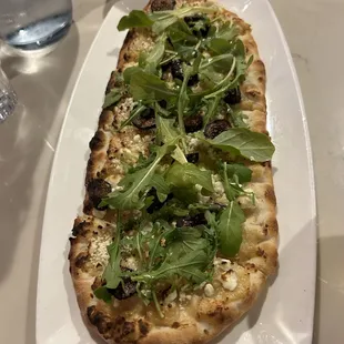 Fig and Goat Cheese Flatbread: roasted garlic, arugula lemon vinaigrette