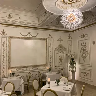 a dining room with a chandelier