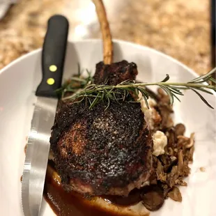 Veal chop w/ risotto &amp; mushrooms.