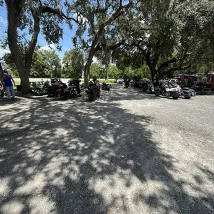 several motorcycles parked in a parking lot
