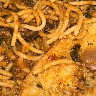 Vegan spaghetti and garlic bread