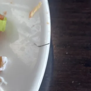 Piece of metal found in my baby back ribs.