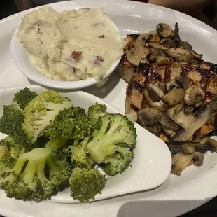 Pork chop marcela, mashed potatoes and broccoli