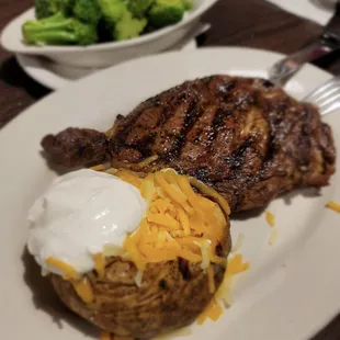 Ribeye n baked potato side of broccoli