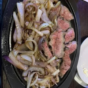 Steak fajitas, medium rare with extra onions no peppers!!