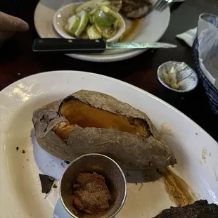 Mahi Mahi with zucchini and squash ($22), blackened (plus $2), and 7 oz. filet mignon blackened (plus $2) and baked sweet potato ($25)