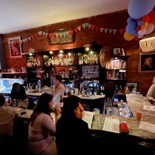 people sitting at a bar