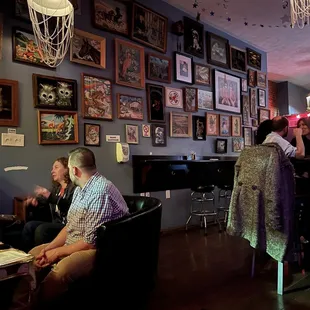 people sitting at a bar