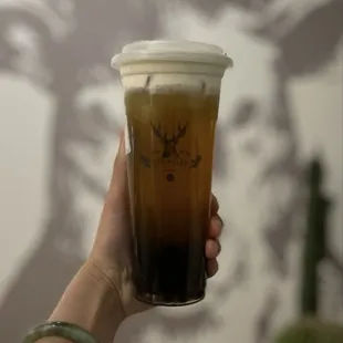 Jasmine Green tea with boba and snow velvet