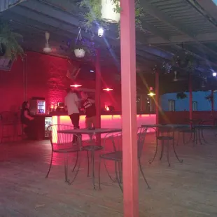 a man standing at a bar