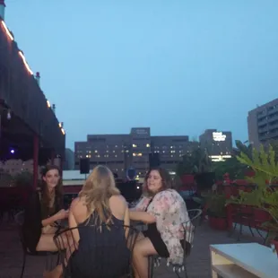 three women sitting at a table
