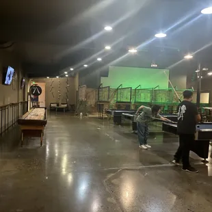 Shuffleboard, pool, axe throwing