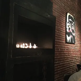 Cozy fire place and great atmosphere for drinks.