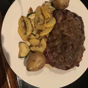 Rib eye with onions