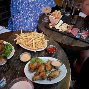 Wings, pork belly bites, truffle fries, cheese board