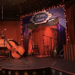 a violin and piano on stage