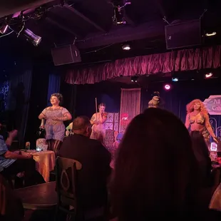 a group of people on stage