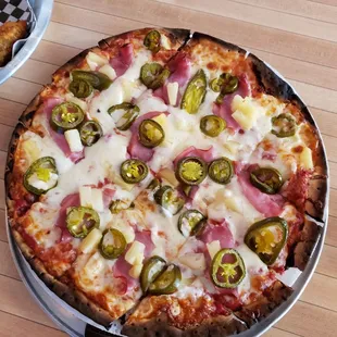 Nice crust, tasty pizza overall.  The bottom crust could have used another minute. Party cut on a 12 inch pizza wasn't my choice.