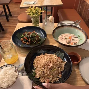 Pictured: crispy pork basil, Tom kha soup and salt/pepper bacon fried rice.
