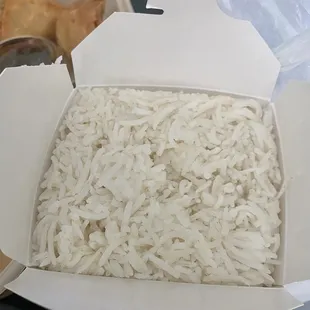 Side of rice since entrees do not come with any. Rice was slightly overcooked and had no flavor, was not basmati