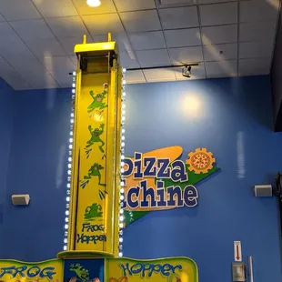 Frog Hopper, ride for kids.  Moves up and down and various speeds.