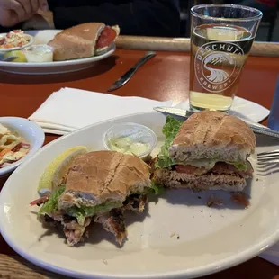 Blackened Salmon Burger with coleslaw and jalapeno mayo