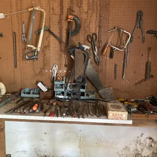 a workbench full of tools